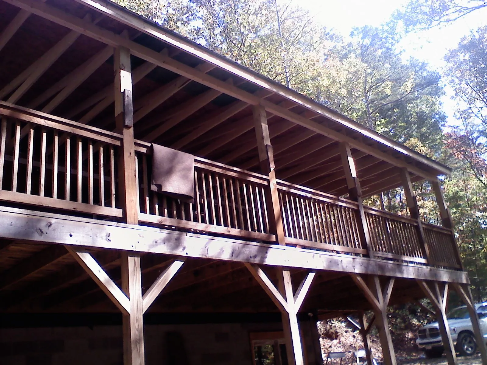 Timber framing under a new elevated porch and deck — Roof Leak Repair in Rogue River by Roofing Brothers